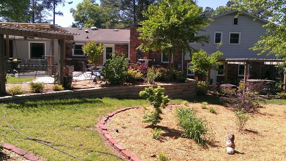 Retaining wall, brick, and vinyl