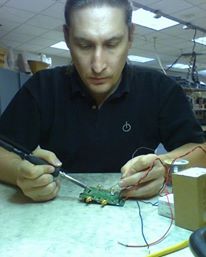 Soldering on a PCB for an RF tuner.