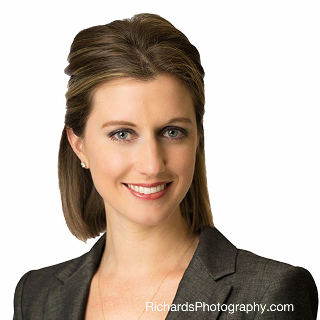 Professional woman headshot with white background 