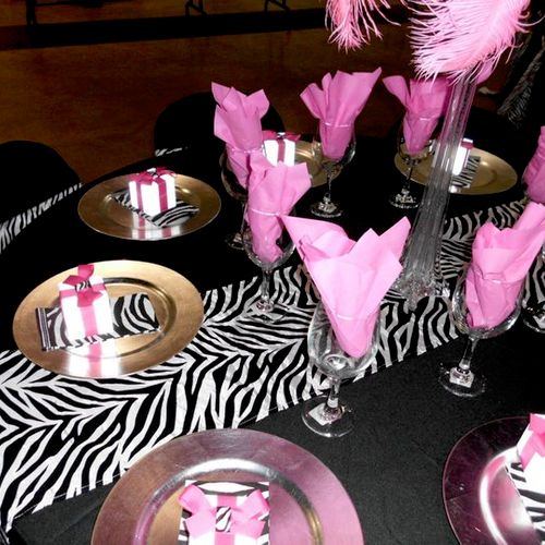 Pink and zebra stripe Sweet 16 table setting