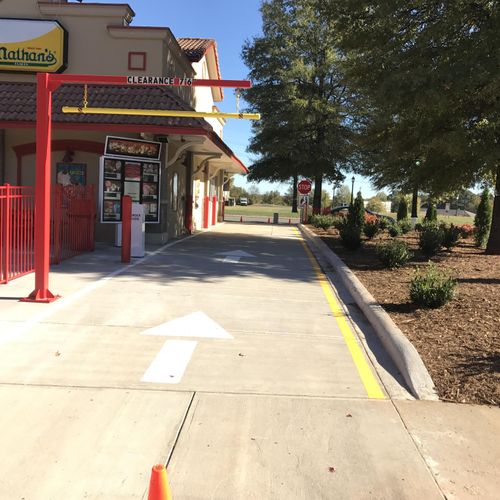 Drive Thru Lane Pavement and curb installation in 