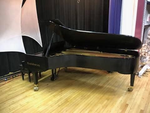 9 Foot Grand just moved up 15 steps to reach its a