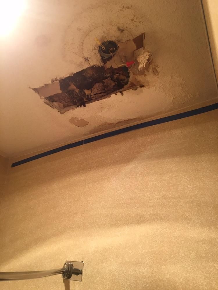 Water leaking from upstairs bathroom toilet We rep