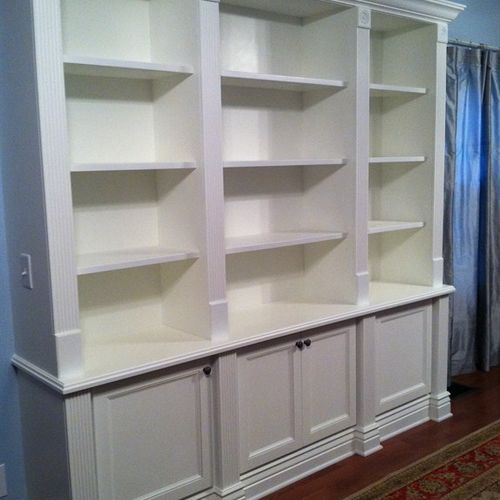 Built-in white lacquered bookcase in historic home