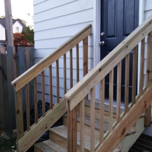 Installation of exterior steel door and stairs whe