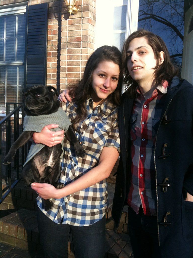 My boyfriend and I with our sweet pug on Thanksgiv