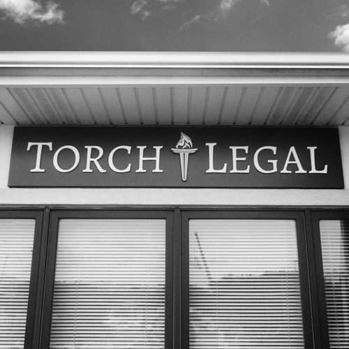 Torch Legal logo on building