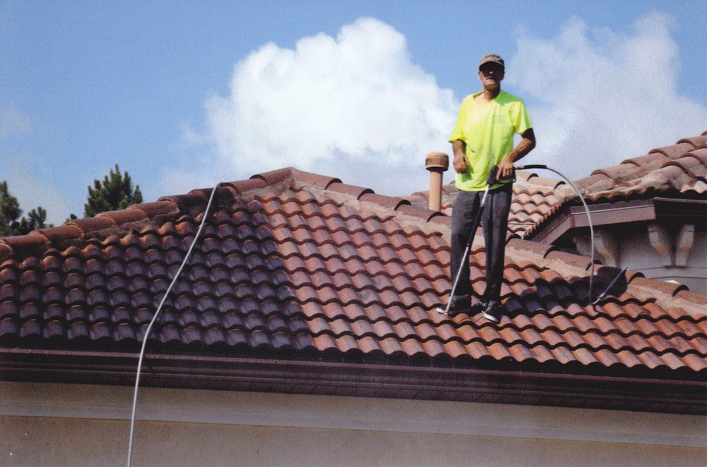 Tile roof dirty on the left and cleaned on the rig