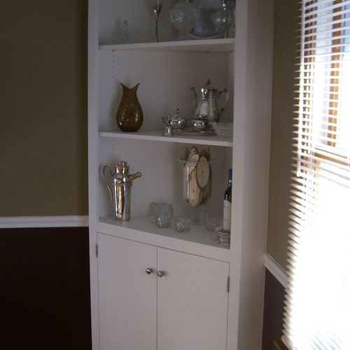 Build, paint and install corner cabinets.
Also ins