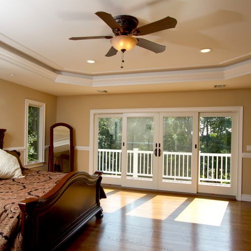 Master bedroom with tray ceiling with imbedded lig