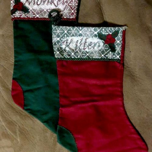 Matching stocking with names in hand embroidery