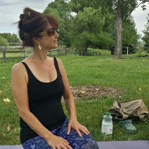 Teaching yoga in the park.