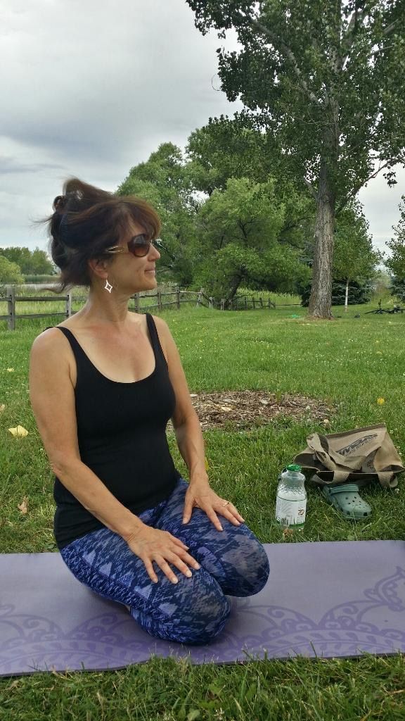 Teaching yoga in the park.