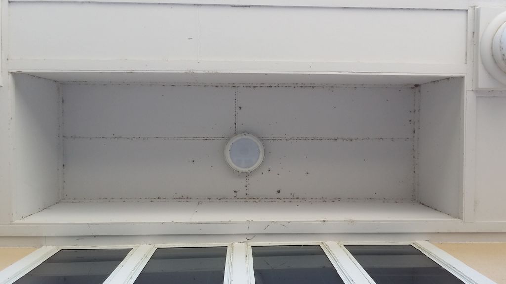 Before power washing high ceilings on commercial b