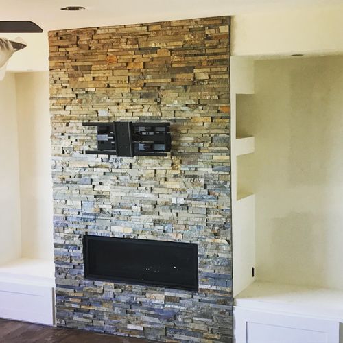 Stacked stone fireplace in Littleton, CO.