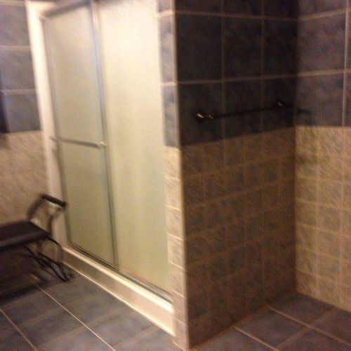 This is a walk in shower with a seat