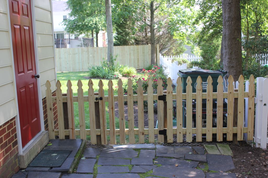 Custom wood picket fence repair and installations.