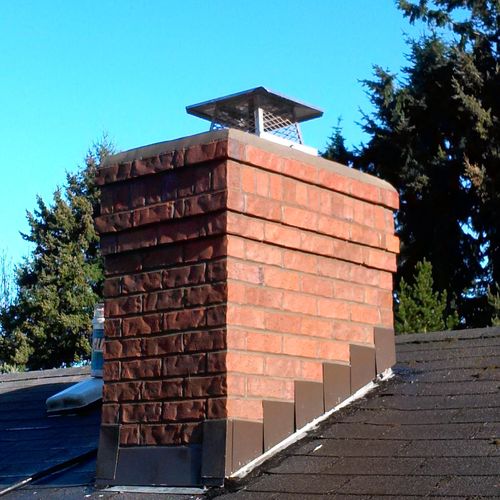 Cedar creek chimney stack with stainless rain cove