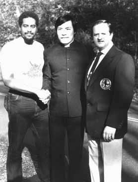 Sterling Johnson with GrandMasters 
Carter Wong an