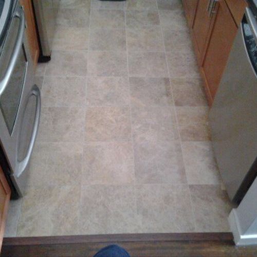 Marble tile floor install.