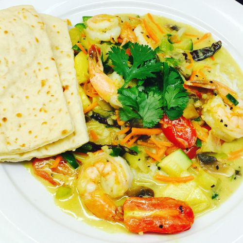 Coconut curry shrimp with basmati rice and naan