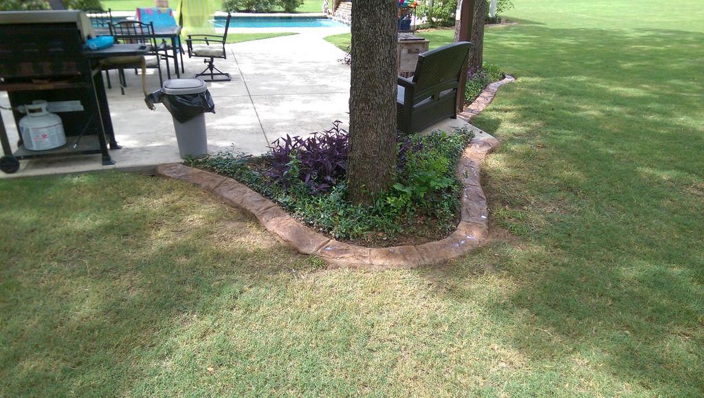 More hand sculpted curbing to look like natural st