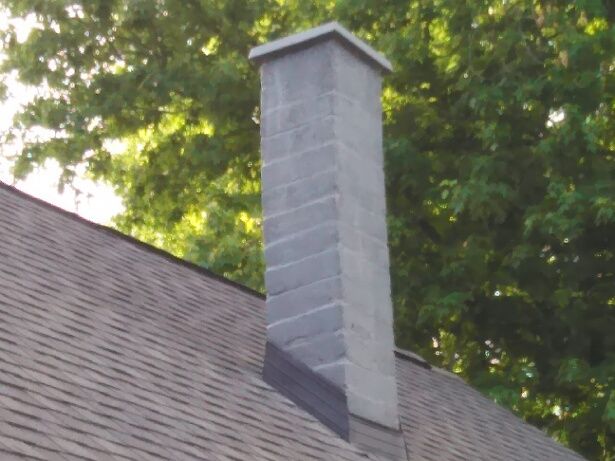 Tuck pointing, painting, flashing and new cap for 