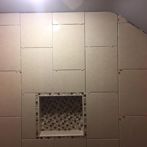 A shower tile job in progress