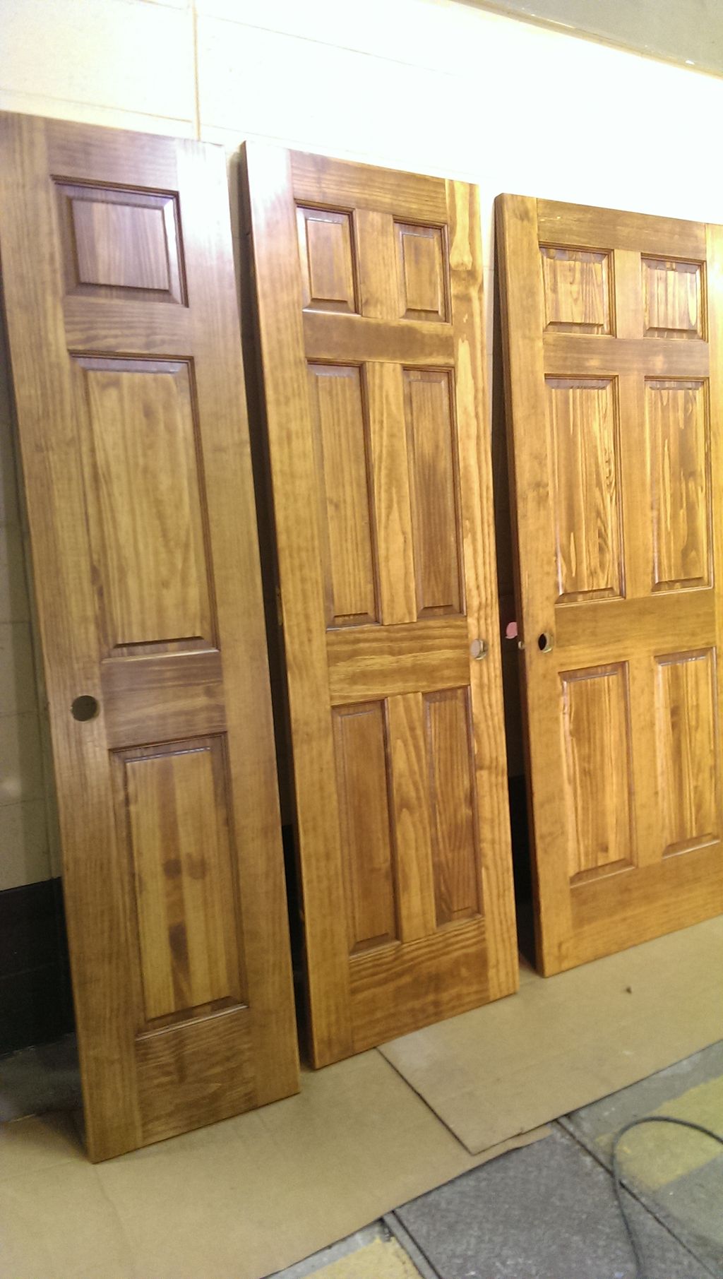 Staining and Finishing a door package for a new bu