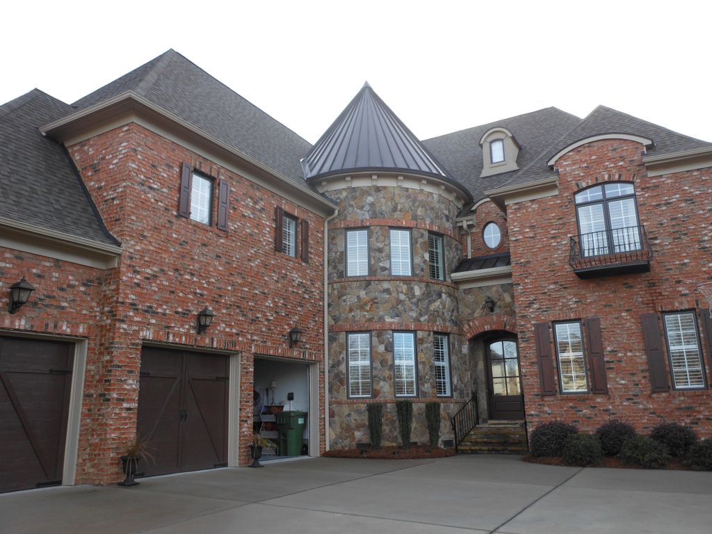 High end very steep roof in Longview