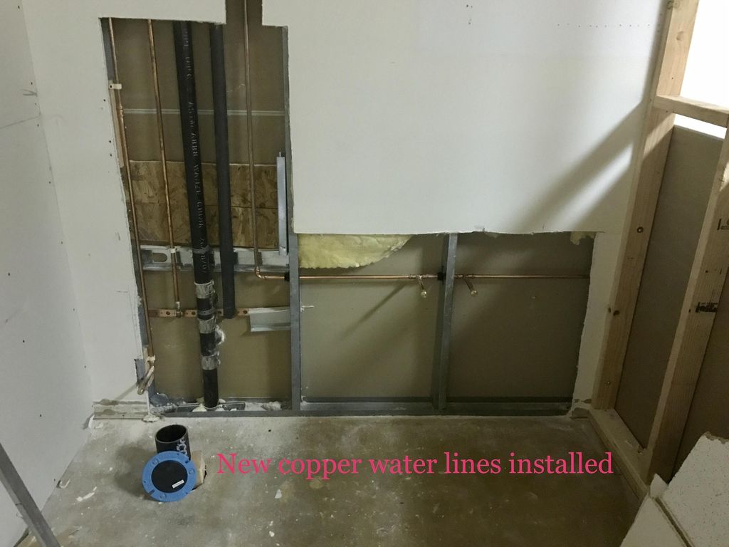 New copper lines in for toilet and sink.