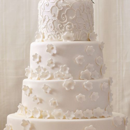 White Wedding Cake draped in beautiful fondant flo