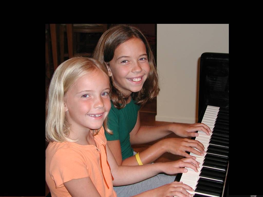 Sisters taking lessons together.