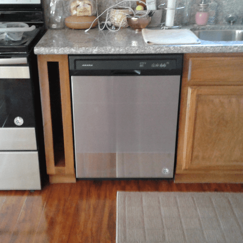after.. No panel next to stove, dishwasher added, 