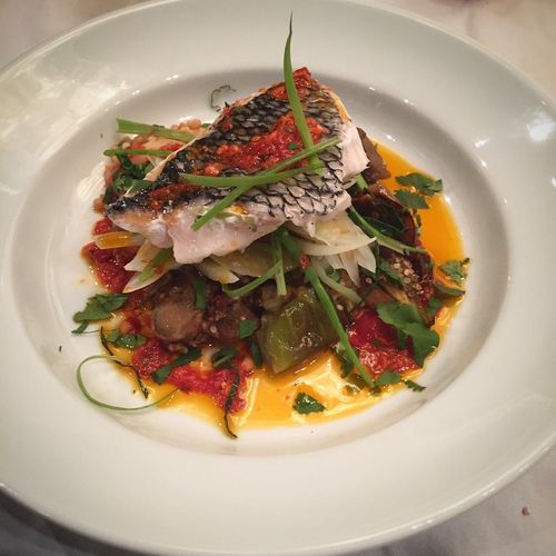 Steamed sea bass with calabrian chile oil, fried P