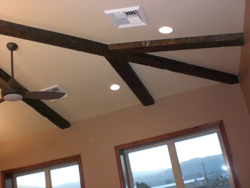 Decorative beams in an office adding character to 