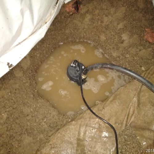 Pumping out water from crawlspace