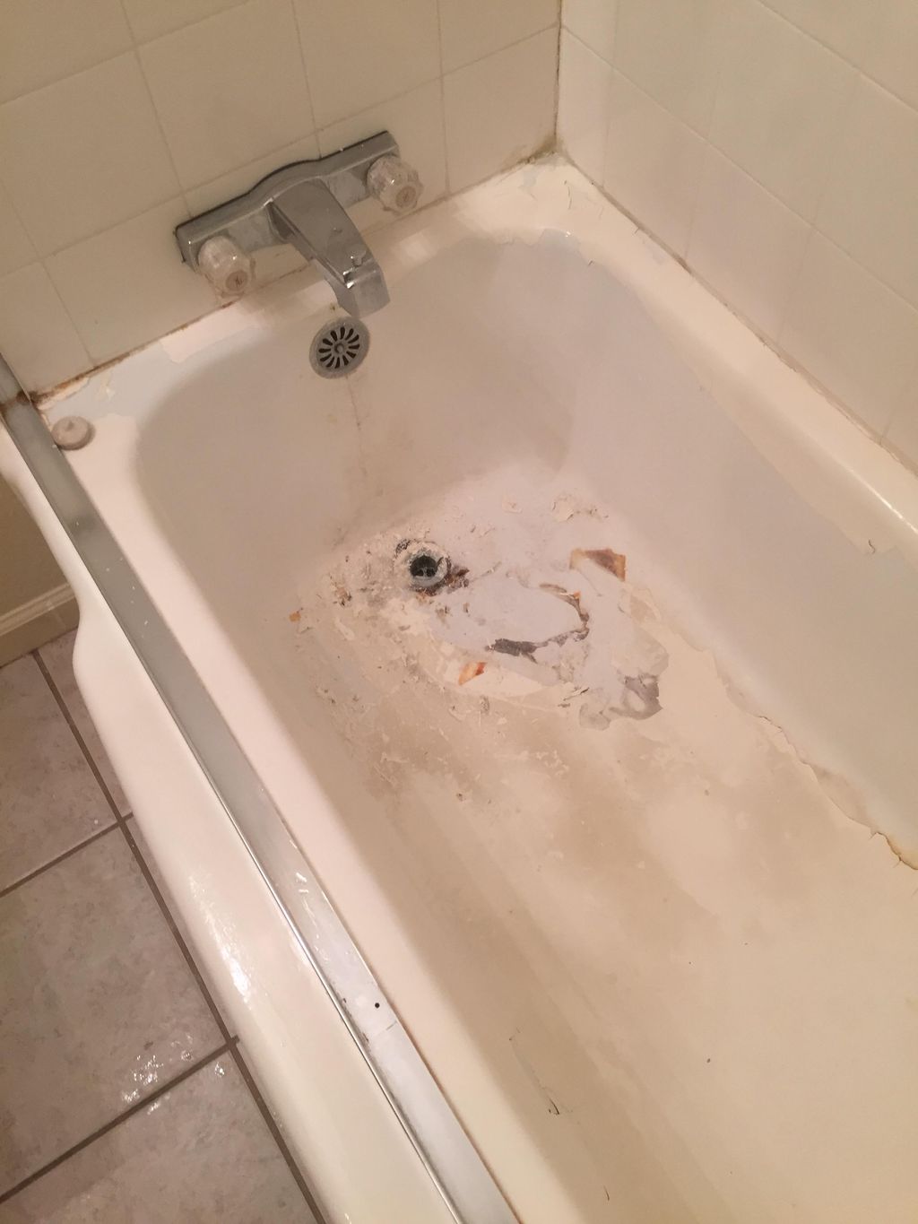 This bathtub needed a little help. Old surface com