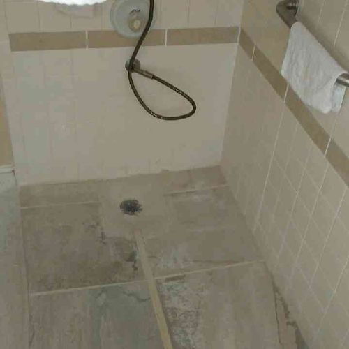 Removed tub, re-tiled and made senior friendly sho