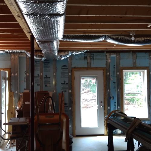 New duct work before sheetrock and boxing is done.