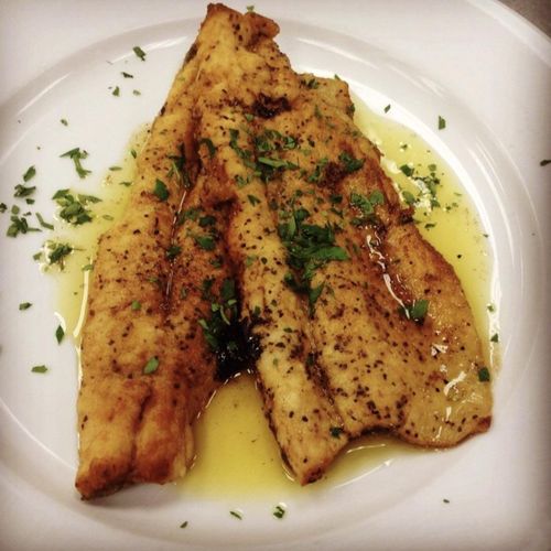 Lightly dredged trout in lemon butter sauce