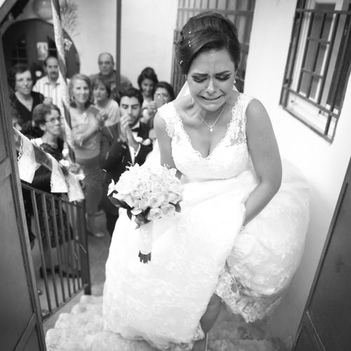 An emotional moment of a beautiful bride leaving h