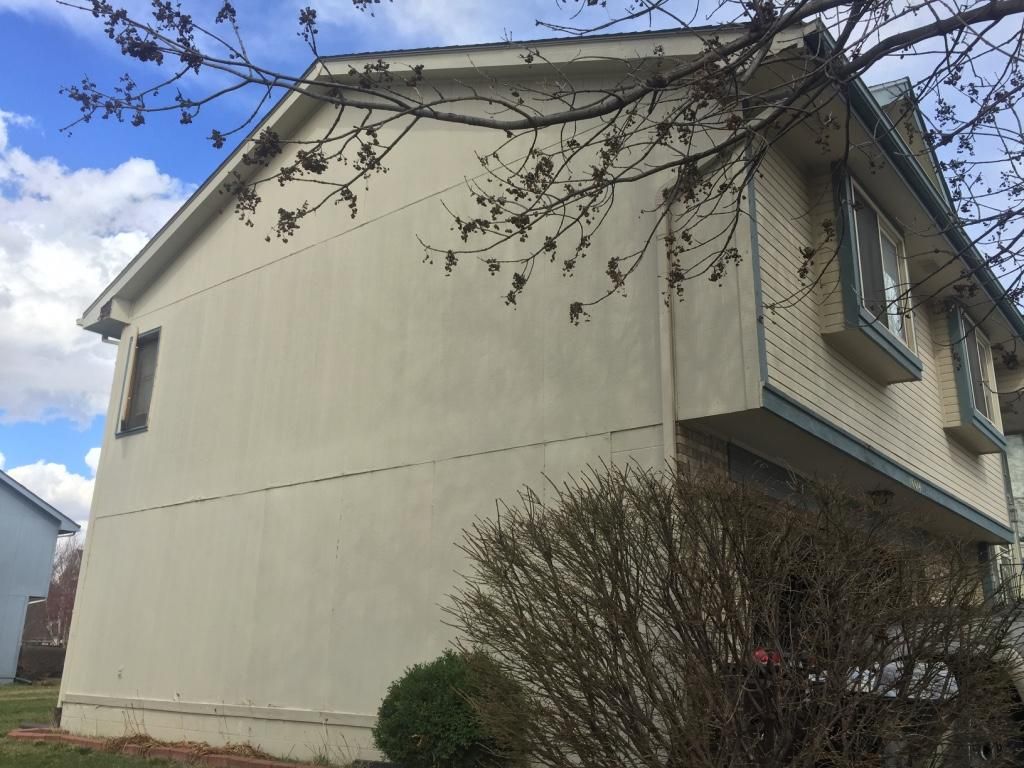 Project #2. Before picture of rotted siding.  Hard