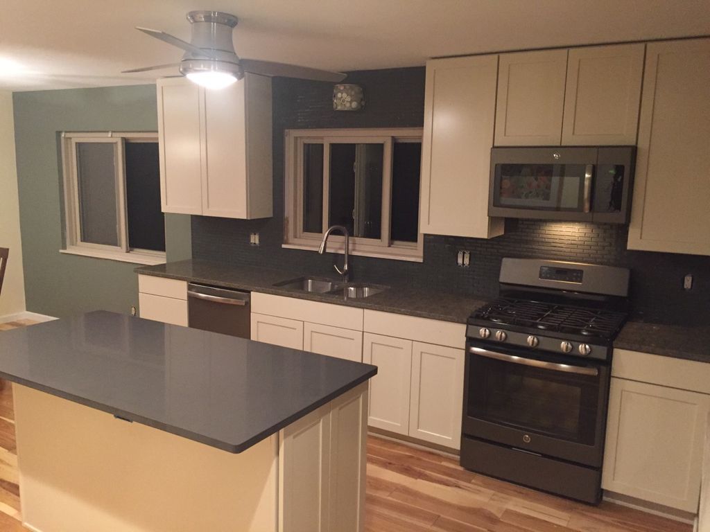 Custom cabinets, appliances, quarts countertops, H