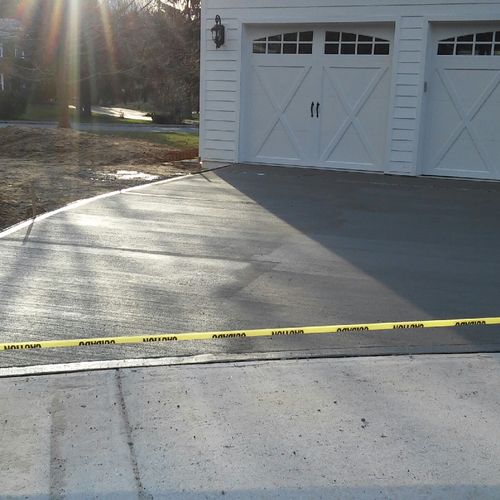 Driveway poured for garage addition in Columbia, M