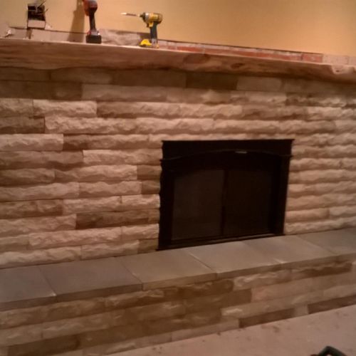 stone installation around fireplace