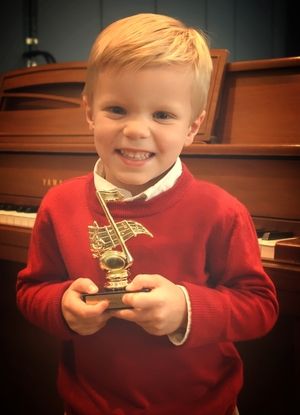 Ethan earned a trophy for 100 consecutive days of 
