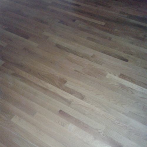 water damage to floors, we striped cleaned and ref