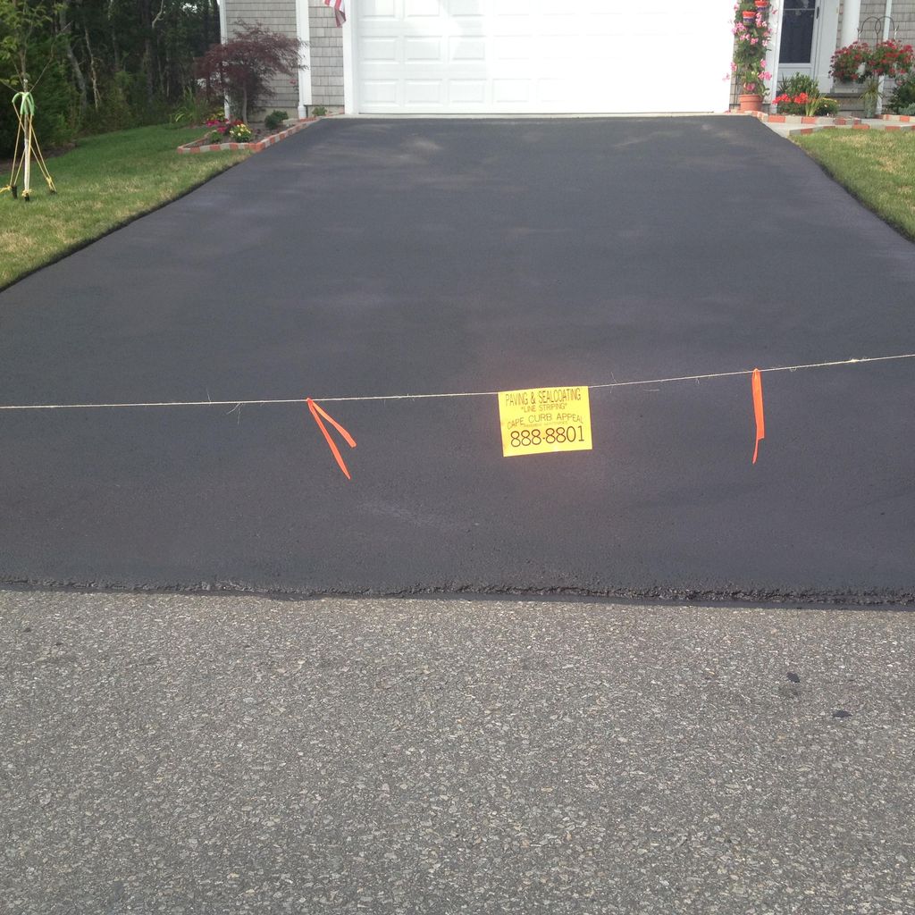 Driveway sealcoating