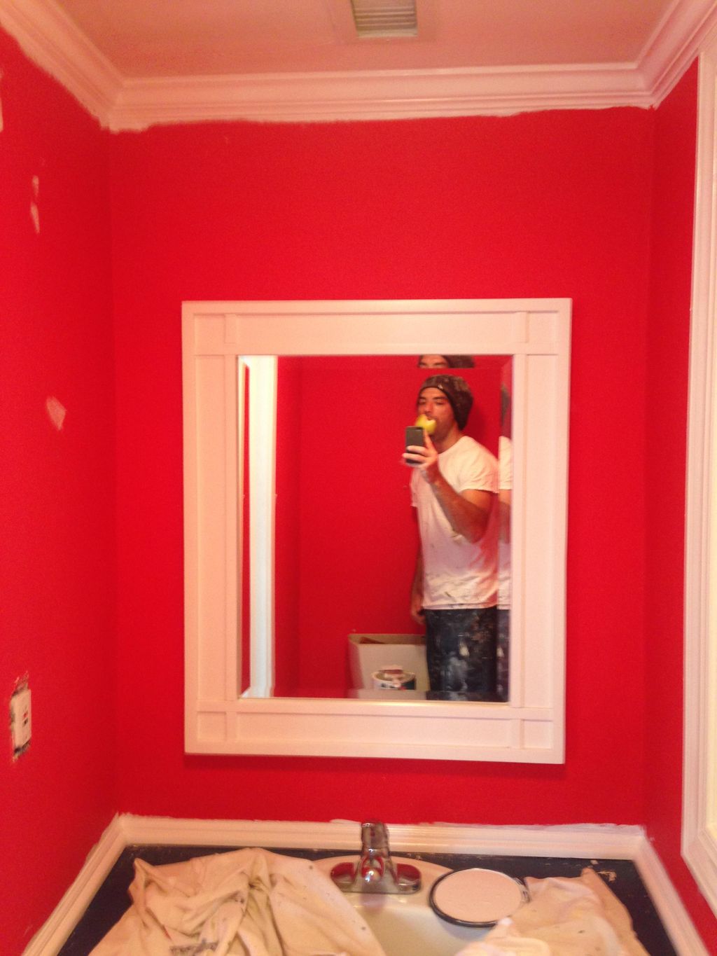 Before. red bathroom
